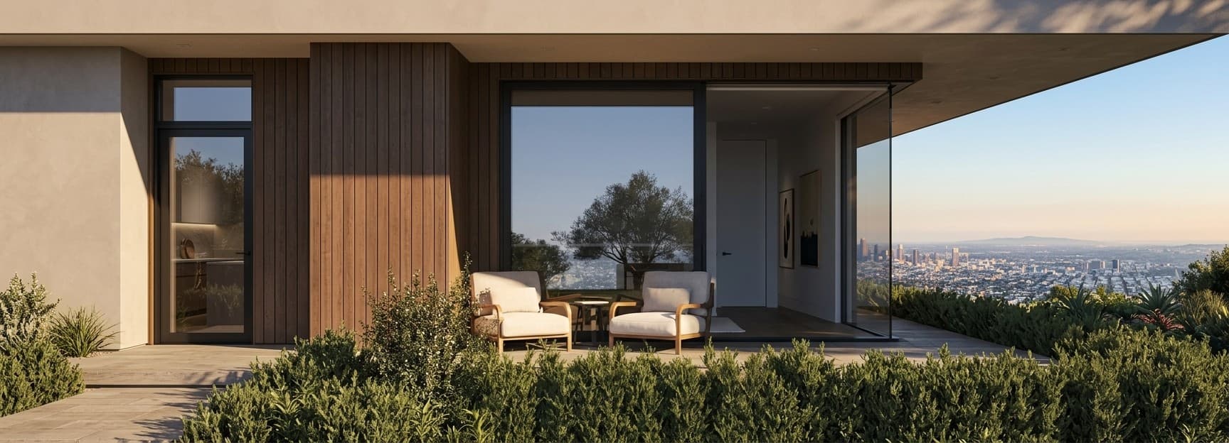 Terrasse en bois et menuiseries extérieures d'une villa gruérienne